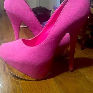 Hot pink heels with gold trim